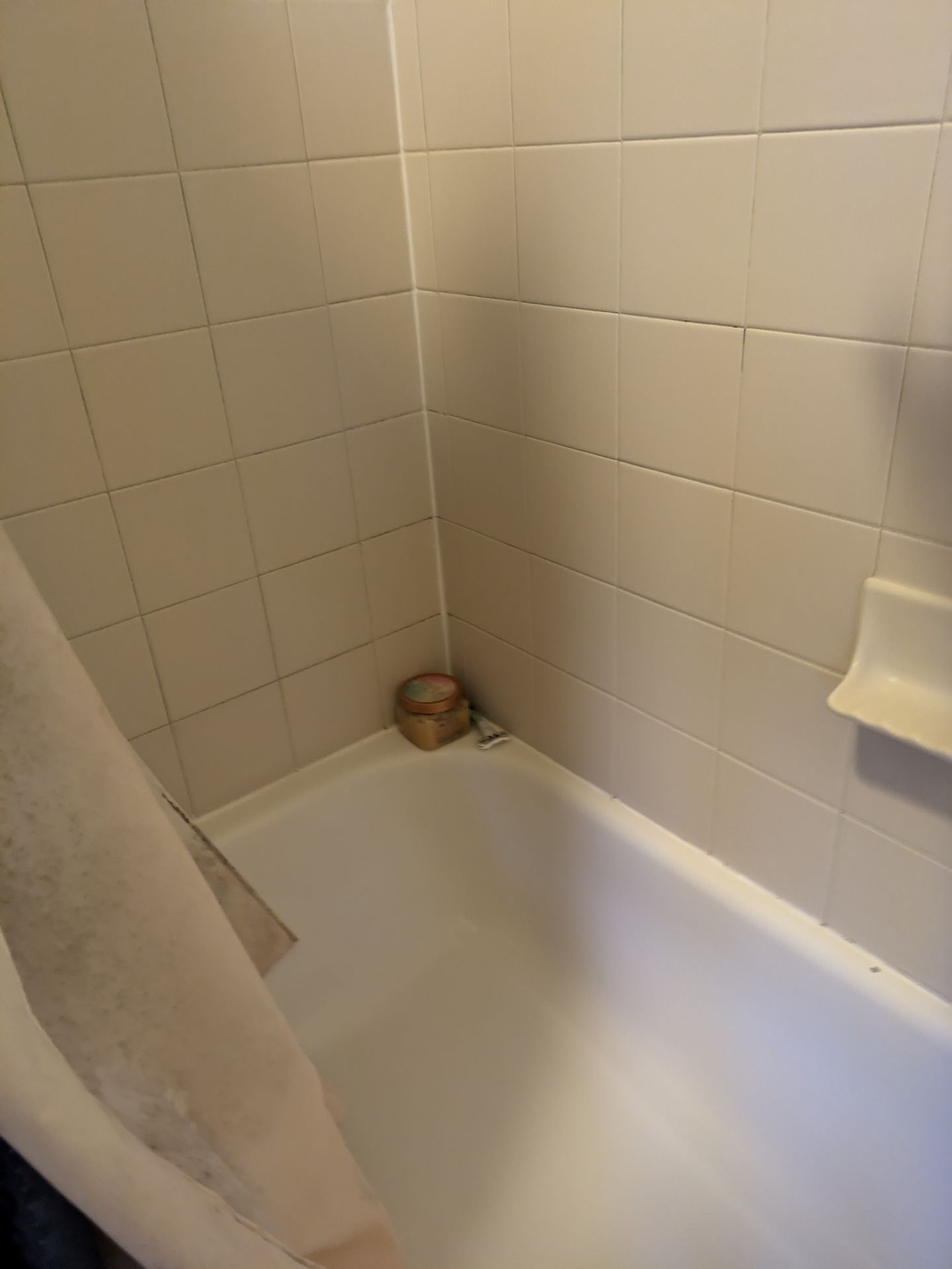 Floor tile layout and spacing in Normaltown bathroom remodel